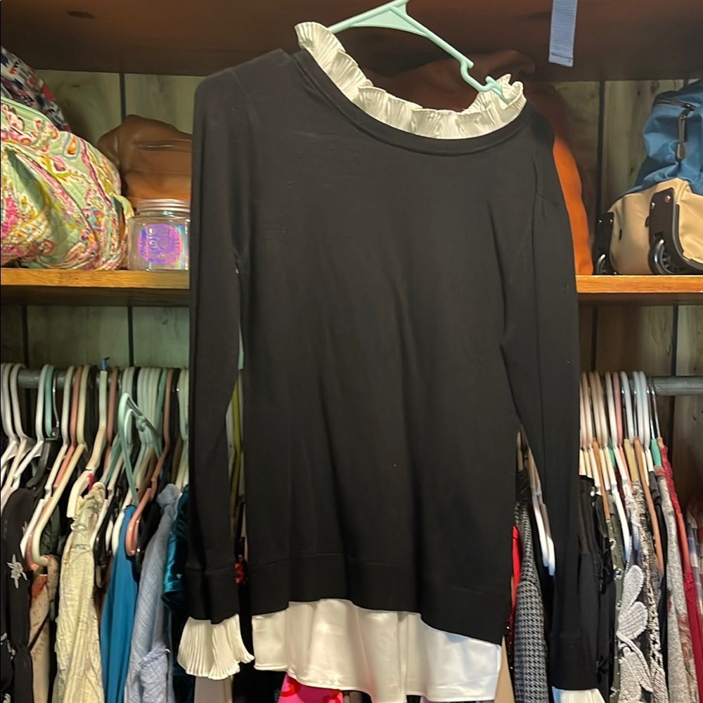 Sioni Black Top with White Ruffle Detail